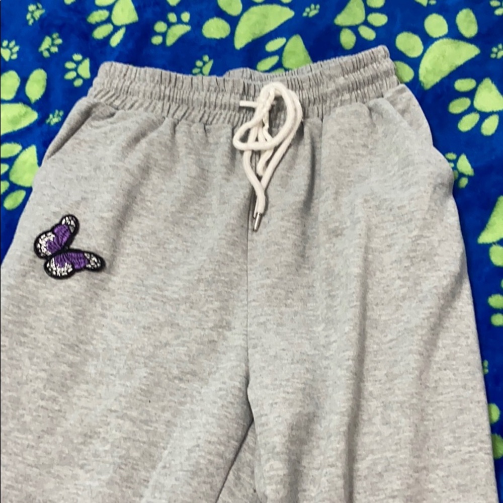 plain grey sweats with butterfly patch